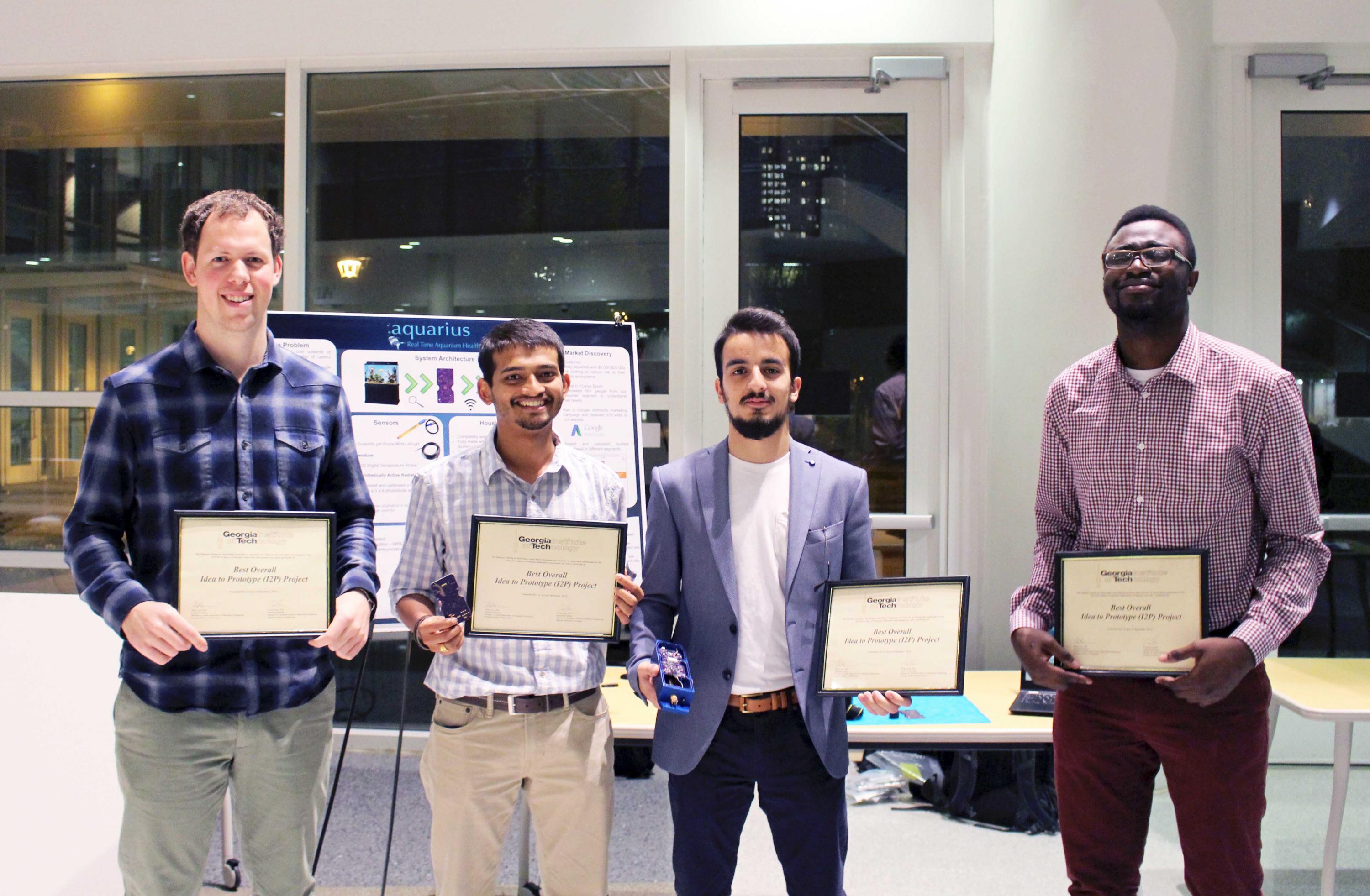 Fall 2016 1st Place Winners, Team Aquarius
Sam Youngdale (ME 2017), Elie Ghossain (ME 2017), Daniel Albequerque (EE), Olatide Omojaro (CS 2018) Fall 2016 1st Place Winners, Team Aquarius
Sam Youngdale (ME 2017), Elie Ghossain (ME 2017), Daniel Albequerque (EE), Olatide Omojaro (CS 2018)